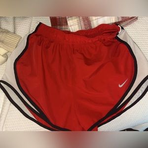 red nike tempo running shorts